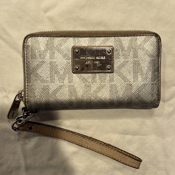 Michael Kors Handbags - Zip around Michael Kors wallet wristlet